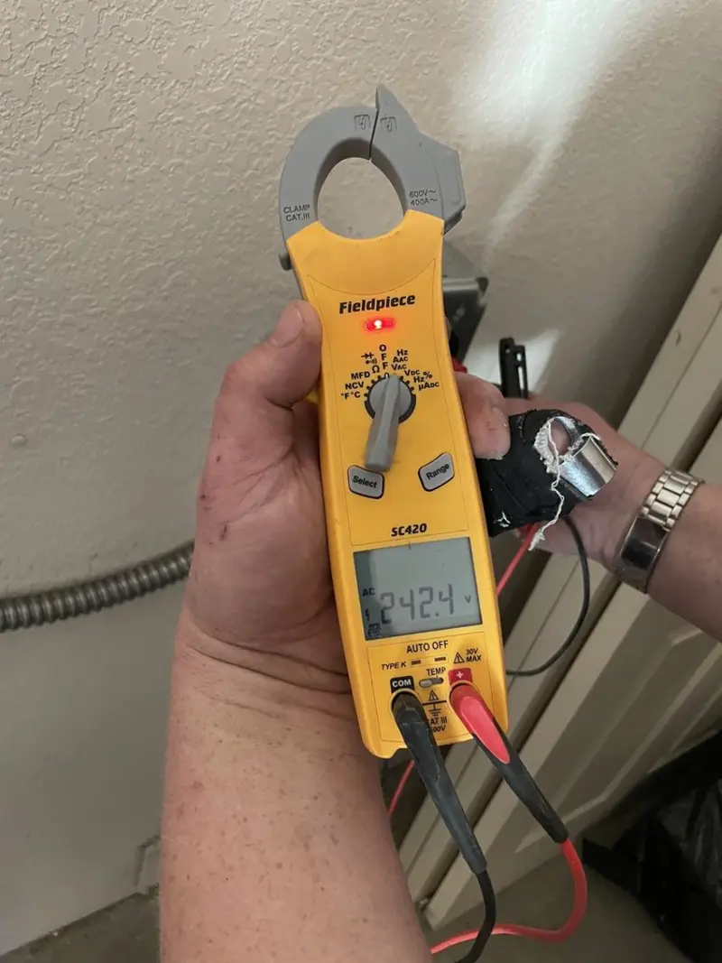 Voltage testing with clamp meter during Circuit Breaker Repair in Wildewood
